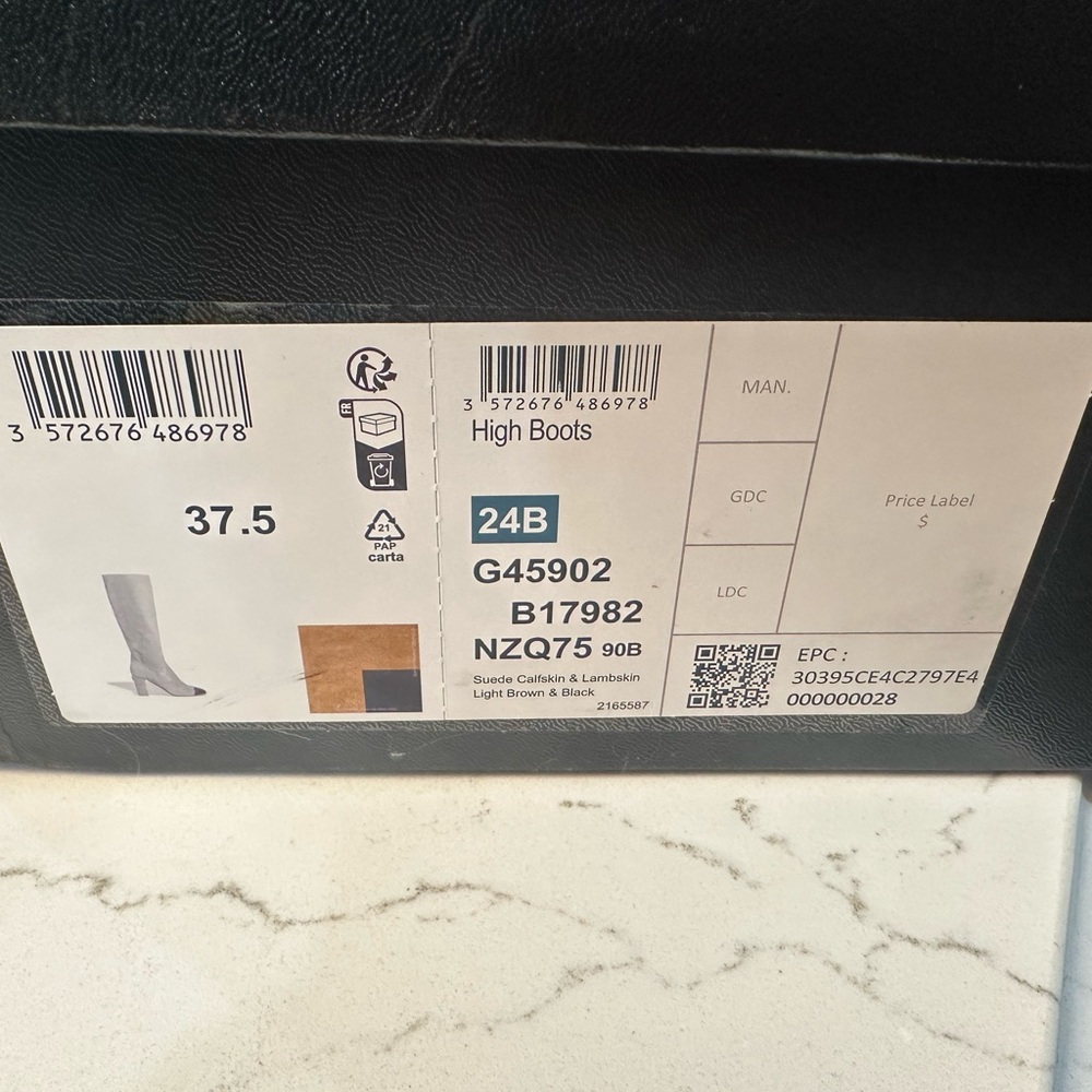 Never worn current season Chanel boots. 37.5